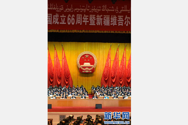10月1日，慶祝中華人民共和國(guó)成立66周年暨新疆維吾爾自治區(qū)成立60周年大會(huì)在新疆人民會(huì)堂隆重舉行。 新華社記者 高潔 攝 