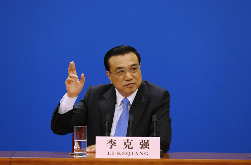 3月15日，國務院總理李克強在北京人民大會堂與中外記者見面，并回答記者提問。 新華社記者 沈伯韓 攝