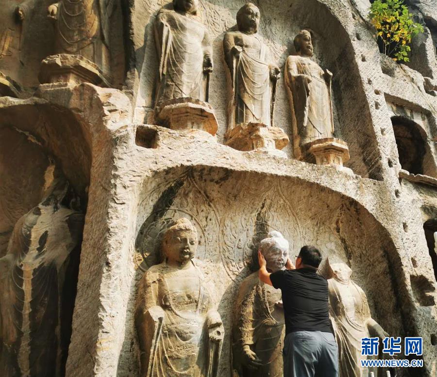 （圖文互動）（4）合體了，龍門石窟流散佛首首次實現(xiàn)“數(shù)字復(fù)位”