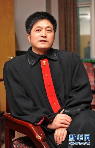 （圖文互動(dòng)）其人如蘭，既潔且馨——追記“全國(guó)模范法官”胡國(guó)運(yùn)