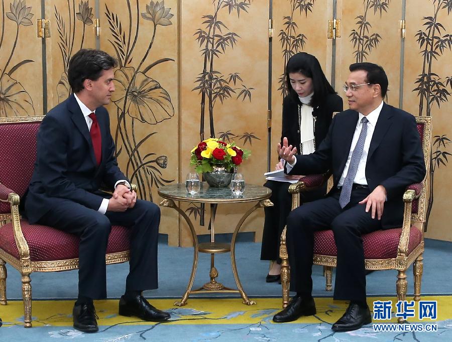 6月18日，國(guó)務(wù)院總理李克強(qiáng)在倫敦會(huì)見(jiàn)英國(guó)工黨領(lǐng)袖埃德·米利班德。新華社記者 龐興雷 攝