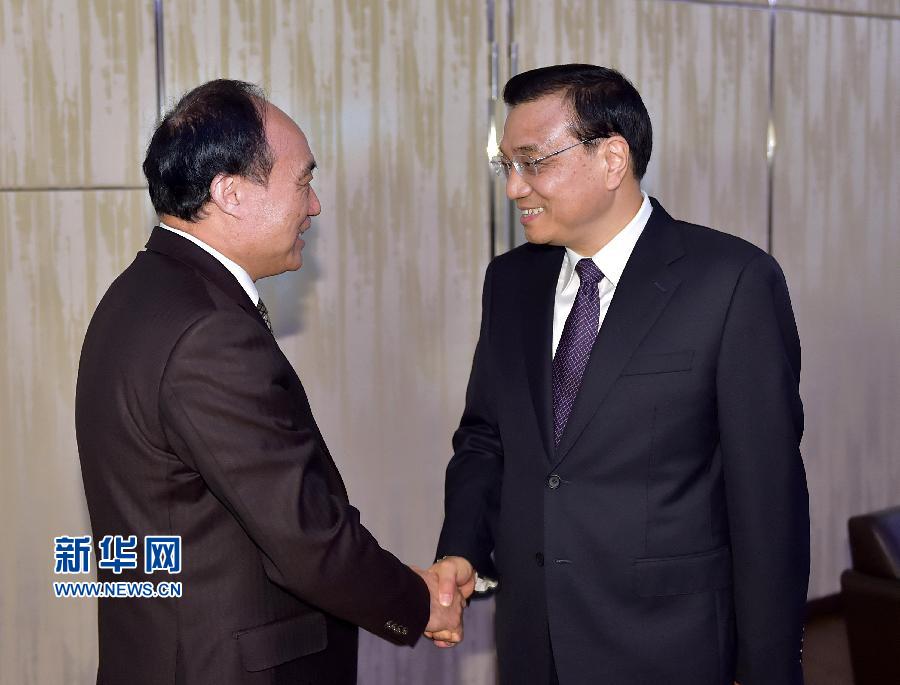 1月22日，中國國務(wù)院總理李克強(qiáng)在瑞士蘇黎世會見國際電信聯(lián)盟秘書長趙厚麟。 新華社記者 李濤 攝 
