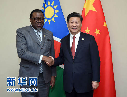 12月4日，國(guó)家主席習(xí)近平在約翰內(nèi)斯堡會(huì)見納米比亞總統(tǒng)根哥布。 新華社記者 張鐸 攝