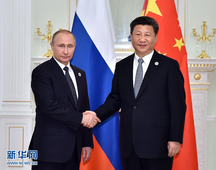 6月23日，國家主席習(xí)近平在烏茲別克斯坦塔什干會見俄羅斯總統(tǒng)普京。新華社記者李濤攝